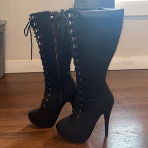 Black long winter heeled boots